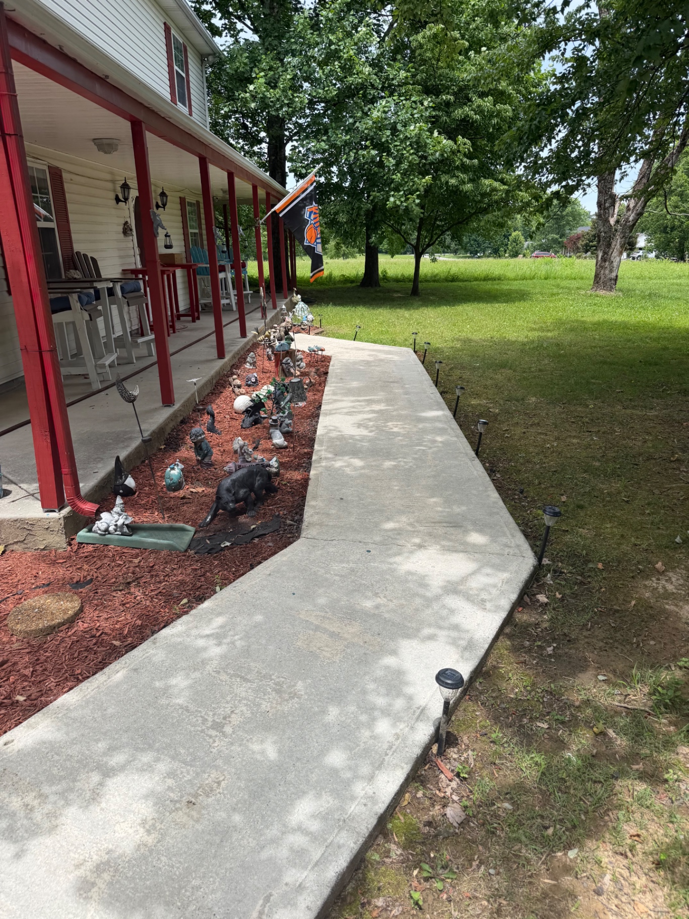 Clean porch and front walkway after pressure washing